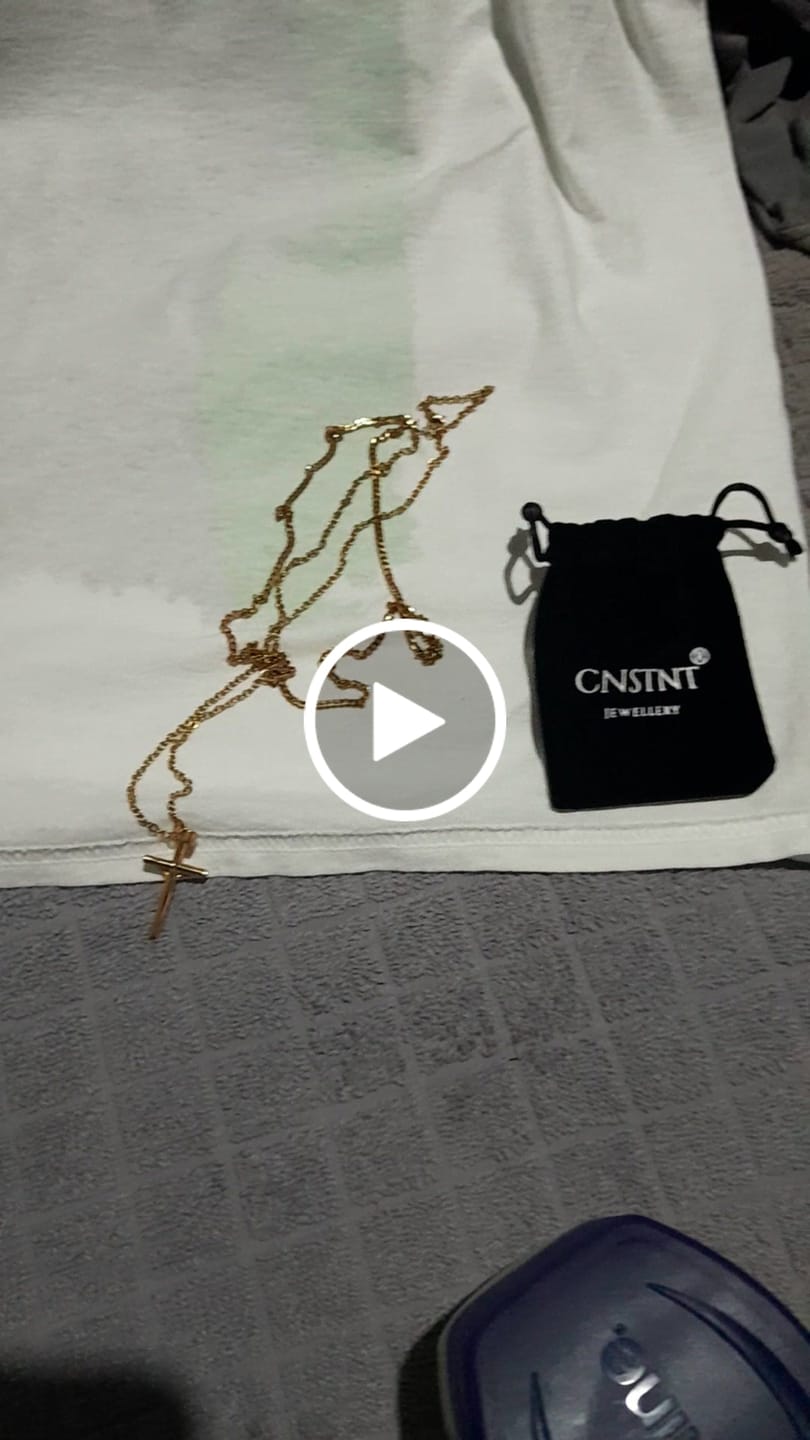 Customer video review of Gold crucifix necklace