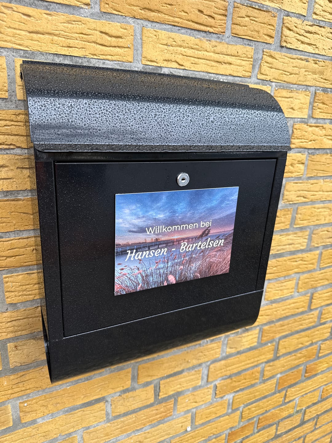 Customer photo review of Familien Türschild (UV- und wetterfest) inkl. Klebebefestigung