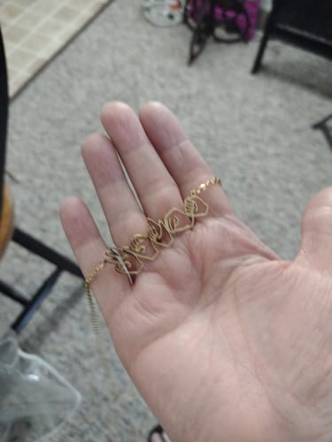 Customer photo review of Personalized Sign Language Necklace with Fingerspelling Name Charm