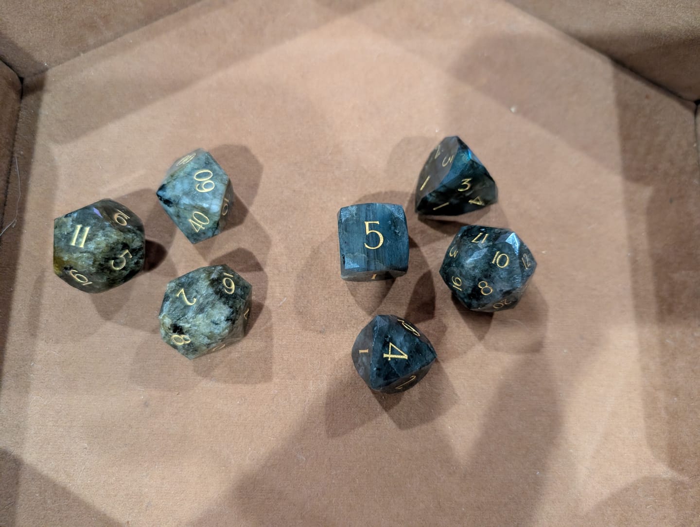 Customer photo review of URWizards D&D Multi-faceted Gemstone Engraved Dice Set