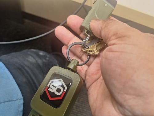 Customer photo review of ONE SHEAR®️ tactical retention leash with belt clip and steel braided line