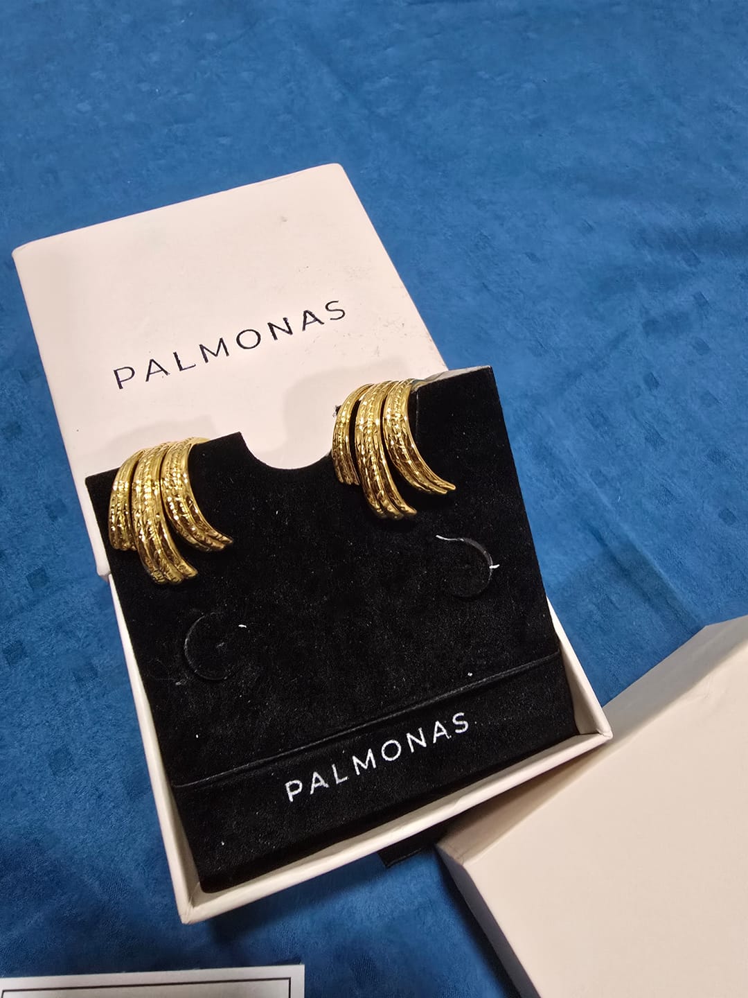 Customer photo review of Statement Gold Stud Earrings