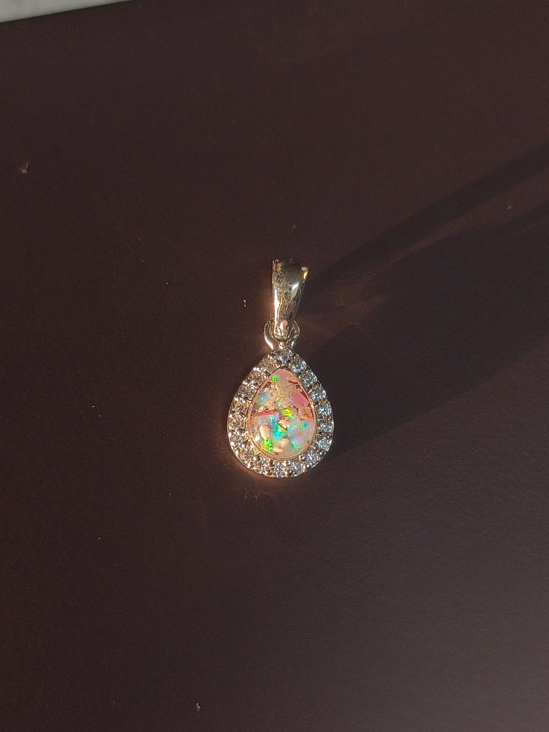 Customer photo review of Dainty Bedazzled Drop Pendant with Cremation Ashes
