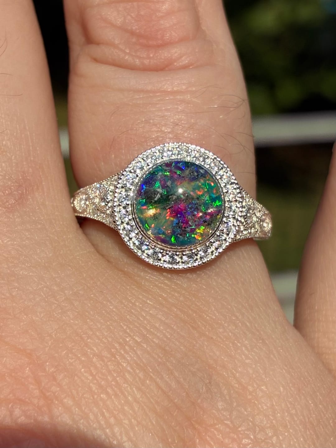 Customer photo review of Bedazzled Filigree Circle Opal Cremation Ring