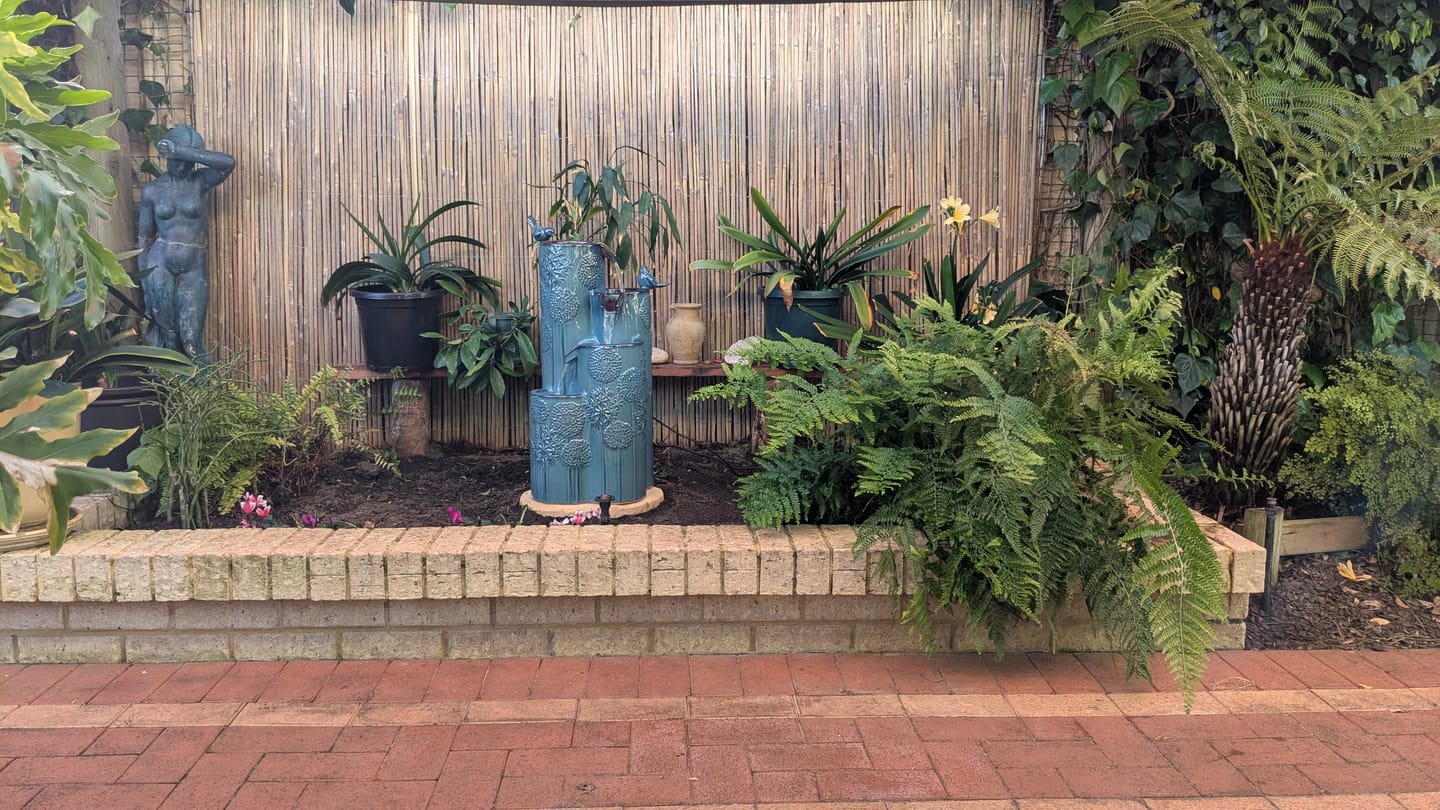 Customer photo review of Dandelion Embossed 4-Tier Ceramic Fountain