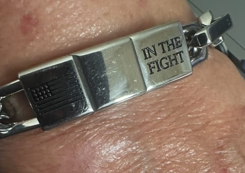 Customer photo review of In The Fight-Never Surrender Bracelet : Helps Pair Veterans With A Service Dog or Shelter Dog