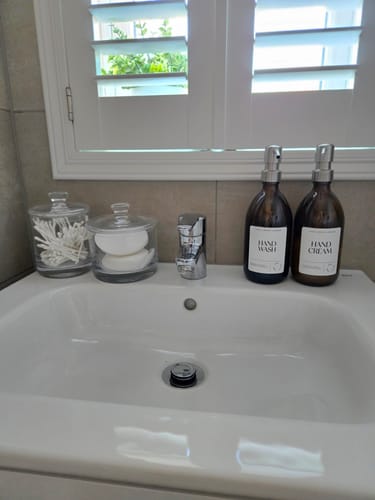 Customer photo review of 500ml Amber Glass Bottle with Metal Pump White Label