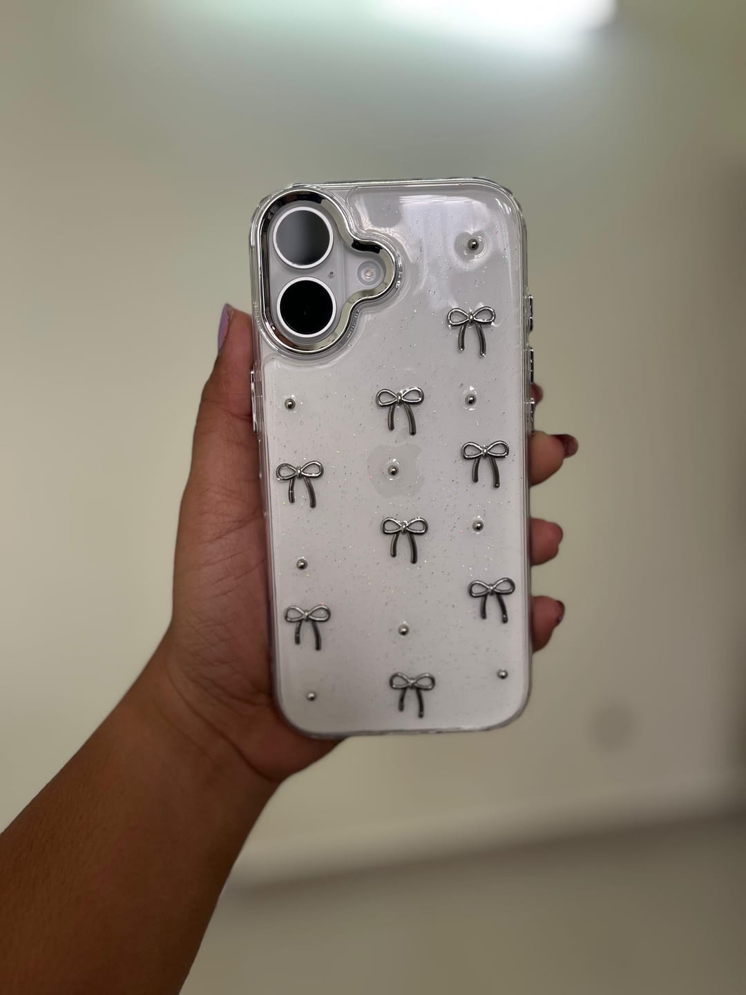 Customer photo review of 3D Glitter Silver Bow Transparent iPhone Case