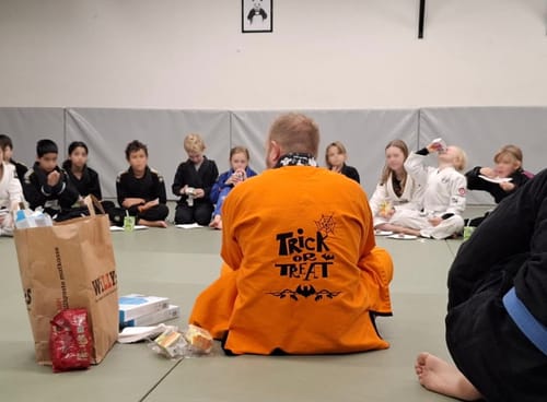 Customer photo review of Halloween Corvus designed Lapel Rash Guard lining Jiu Jitsu (BJJ GI)