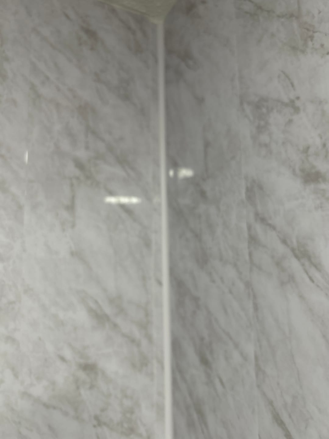 Customer photo review of 8mm Storm Grey Marble Bathroom Wall Panel 2.6M