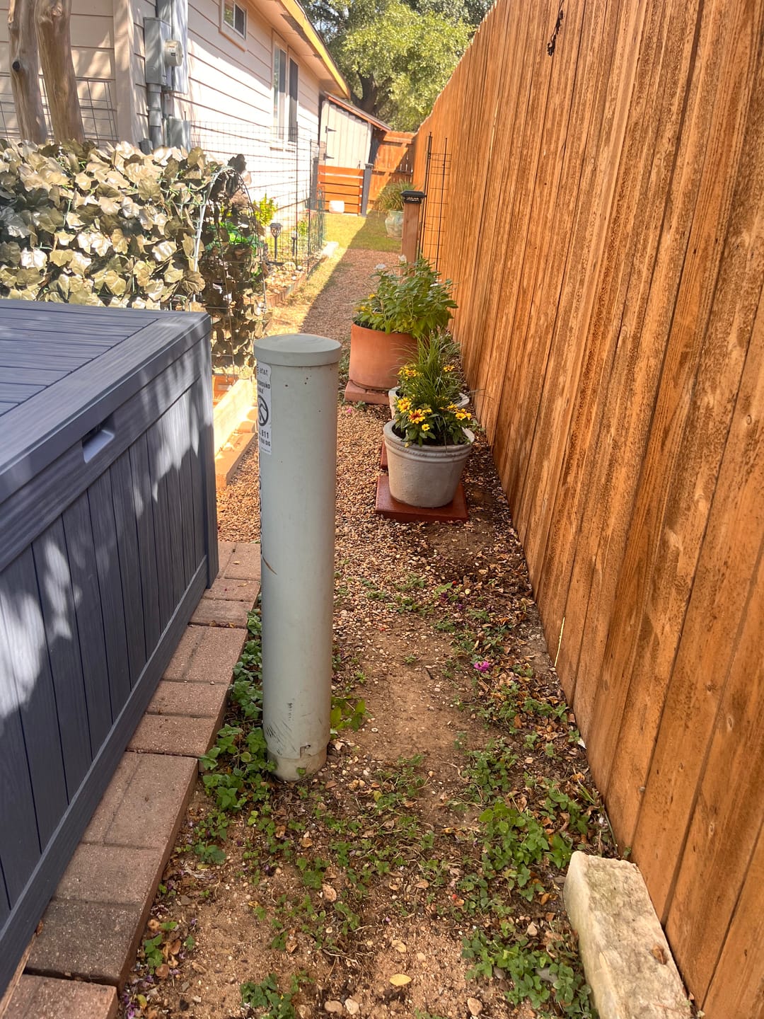 Customer photo review of Fern with Stem Garden Columns  – Metal Outdoor Sculpture & Well Cover – Rustic Steel Garden Decor