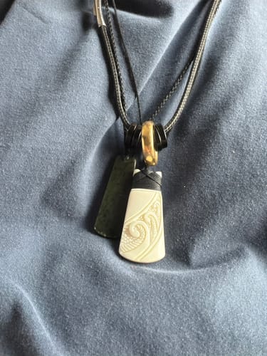 Customer photo review of Maori Bone Toki Necklace with Koru