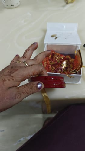 Customer photo review of Anmol Bandhan Gold Bangles –  Love & Togetherness crafted in Gold