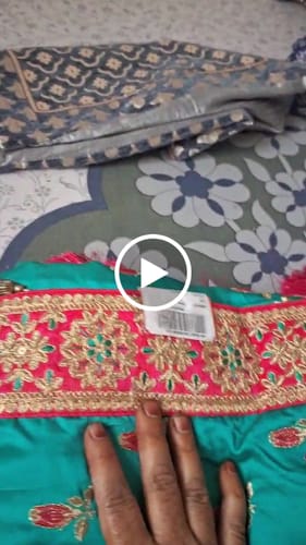 Customer video review of Turquoise Festive Wear Embroidered Silk Saree