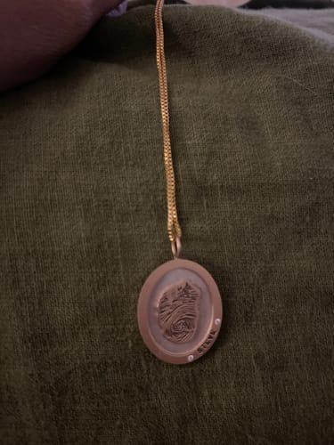 Customer photo review of Raised Gold Fingerprint And Name Oval Charm