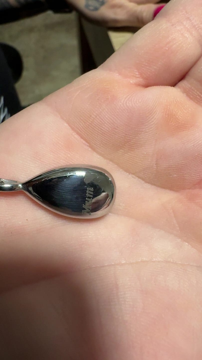 Customer photo review of Drop Cremation Urn Teardrop Shaped Necklace for Ashes-A035