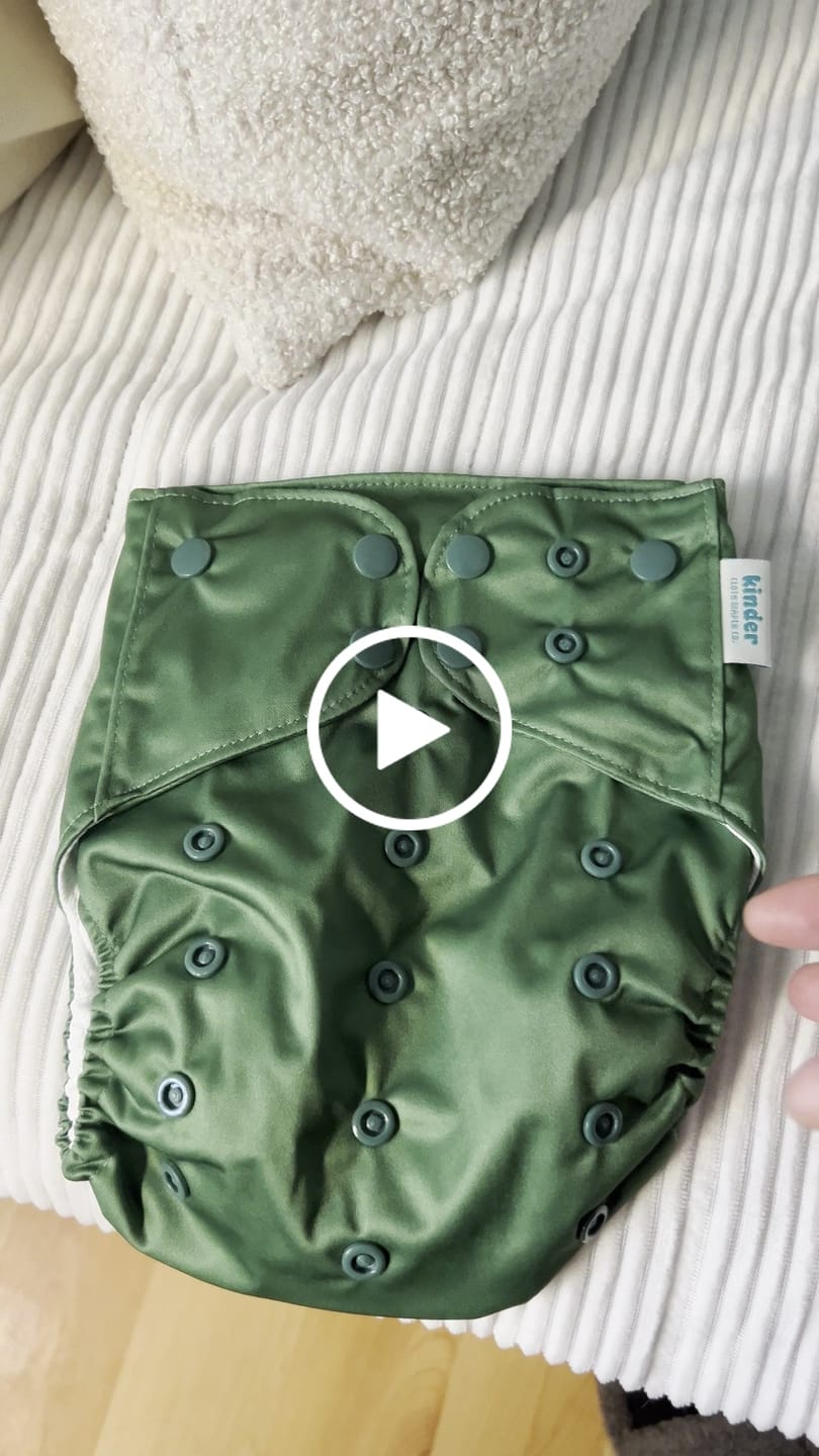Customer video review of Solid Color: Essentials Pocket Cloth Diaper with Athletic Wicking Jersey, Grows with your Baby