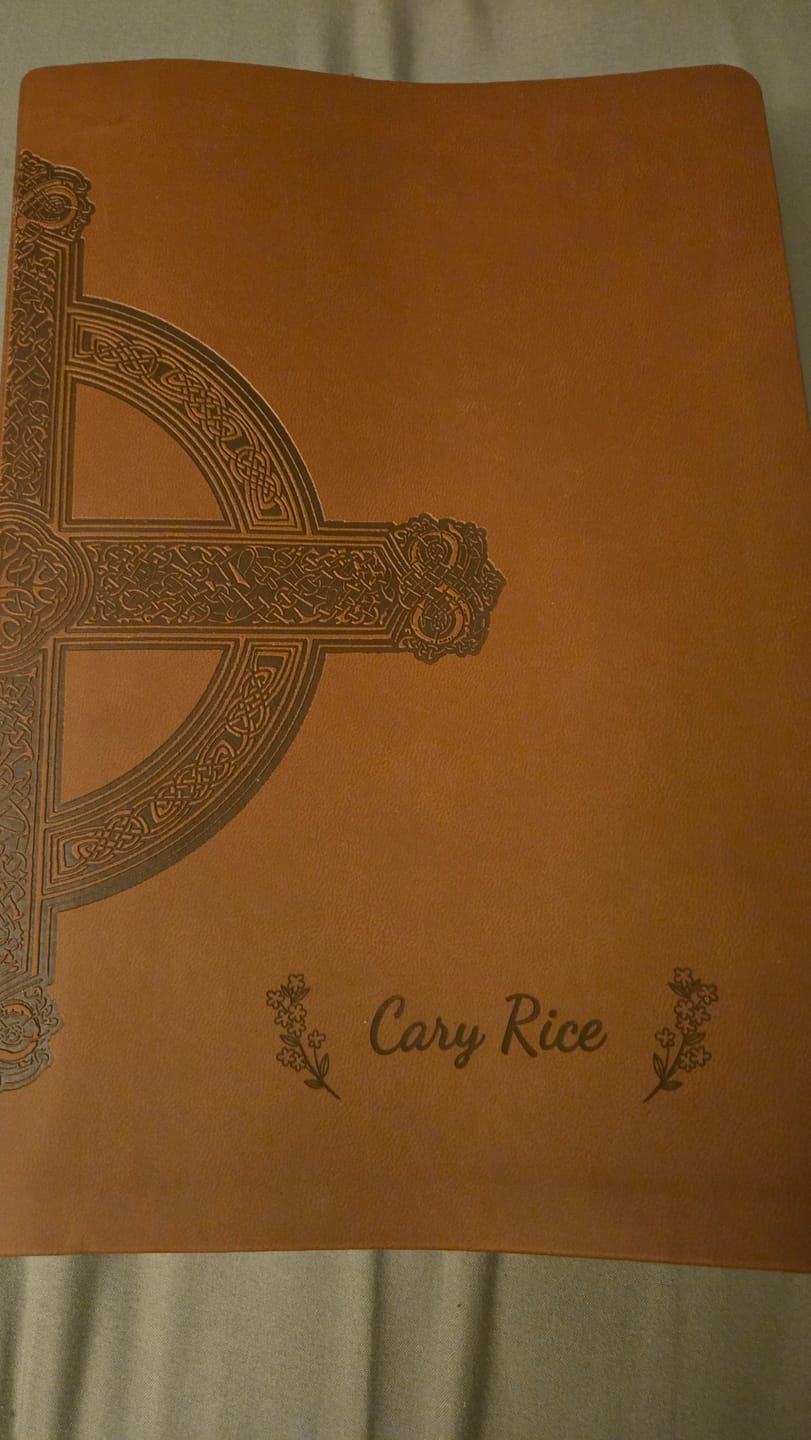 Customer photo review of Personalized NLT Large Print Value Thinline Bible - Brown Celtic Cross - Engraved Floral Frame