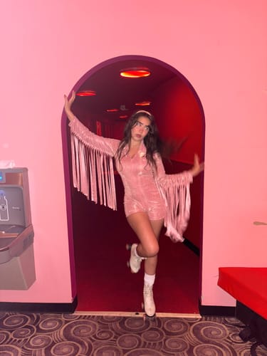 Customer photo review of Glitter Fringe Romper in Orange