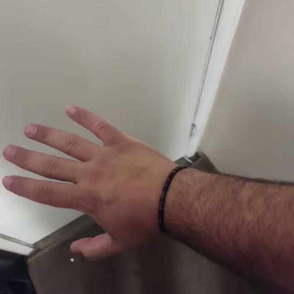 Customer photo review of Obsidian 'Strong as Fuck' Morse Code Bracelet
