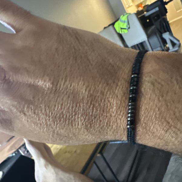 Customer photo review of Obsidian 'Strong as Fuck' Morse Code Bracelet