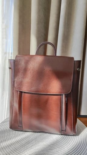 Customer photo review of Bolsa Mochila de Couro Feminina
