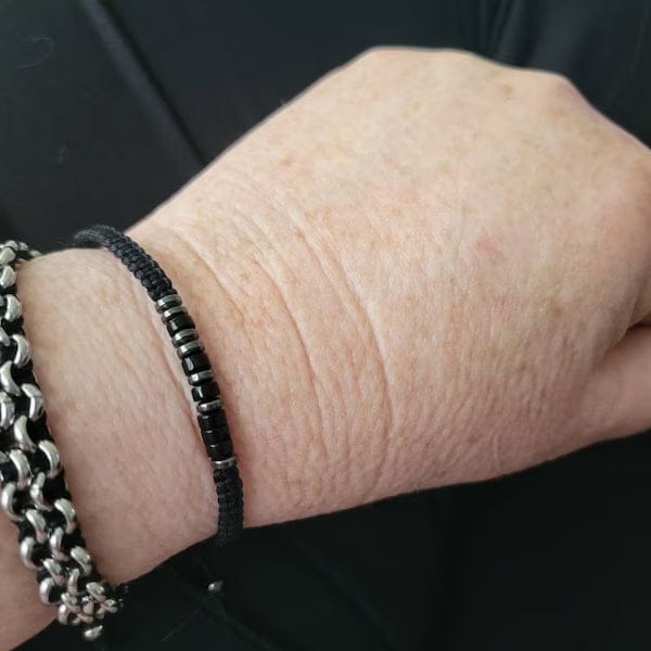 Customer photo review of Obsidian 'Strong as Fuck' Morse Code Bracelet