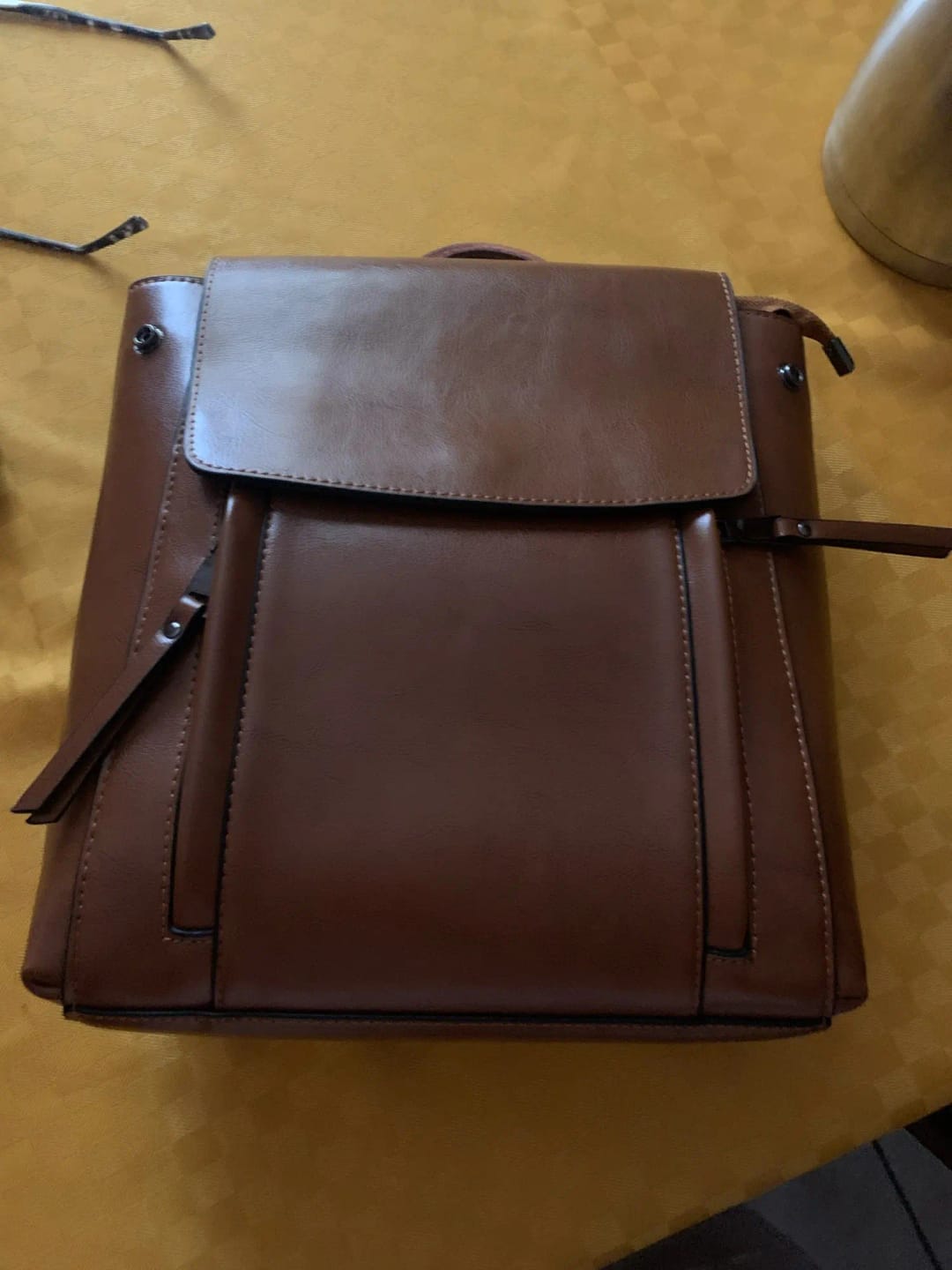 Customer photo review of Bolsa Mochila de Couro Feminina