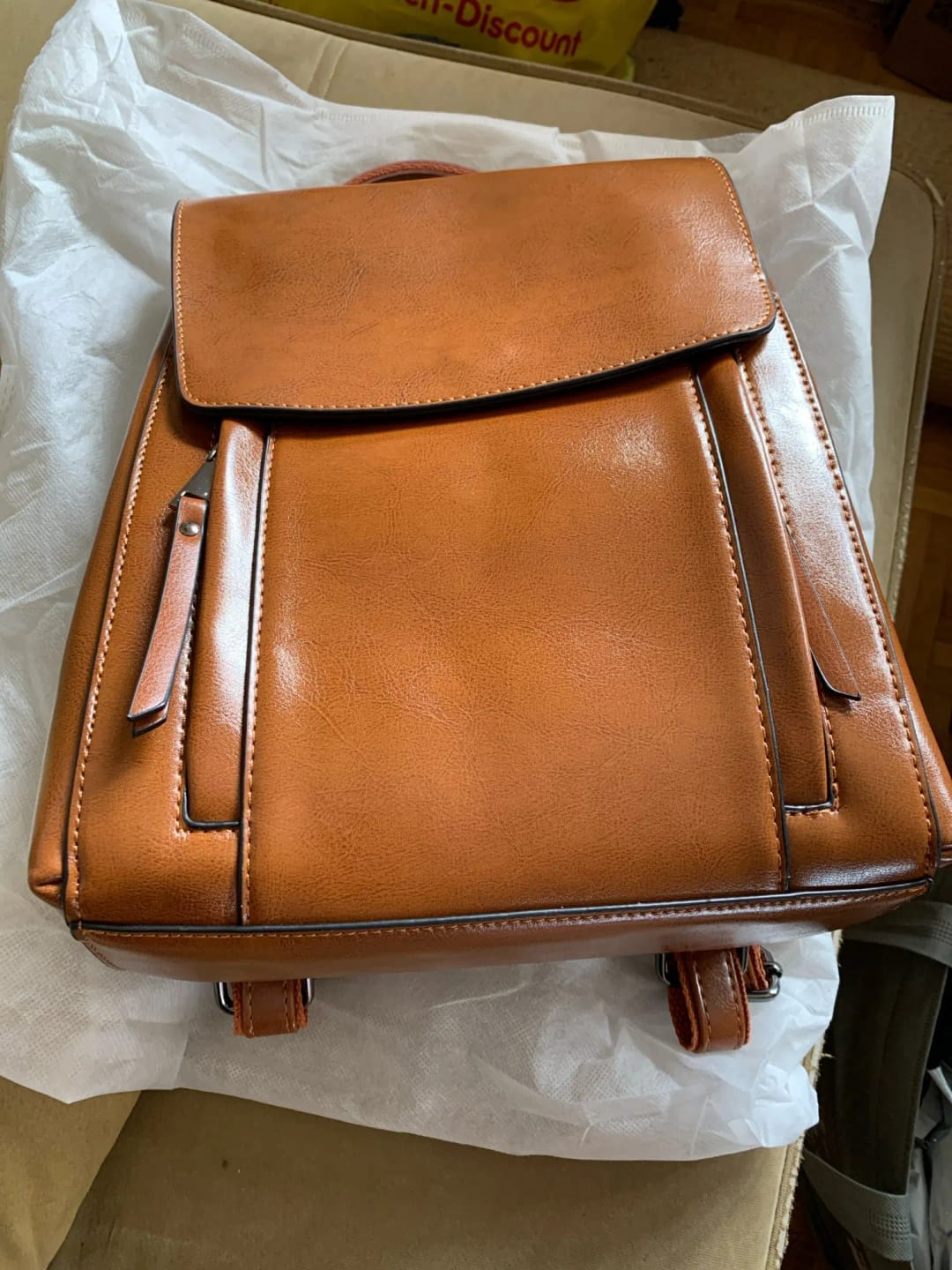 Customer photo review of Bolsa Mochila de Couro Feminina