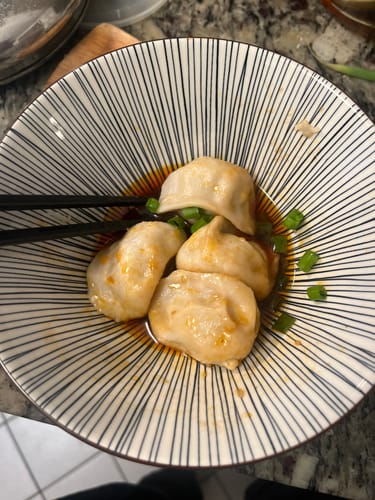 Customer photo review of Frozen [F4] Lamb Dumplings w/ Spicy & Sour Sauces (35 Pieces/7 Servings)