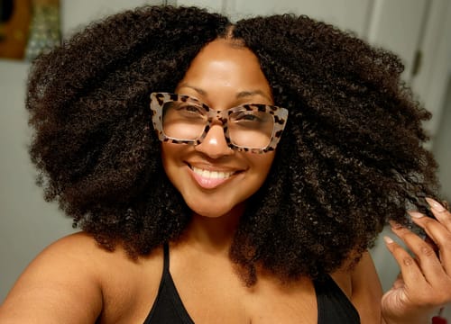 Customer photo review of Multi-Textured Kinky Curly Crochet Hair Extensions Human Hair