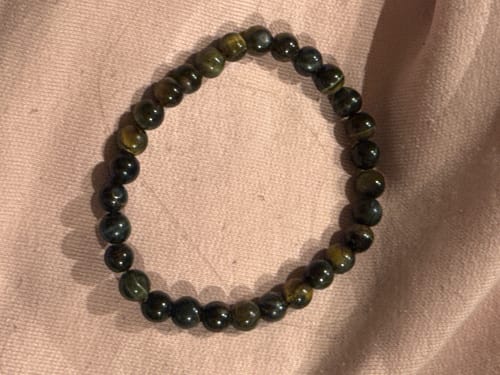 Customer photo review of Pulsera Ojo de Halcón - 6mm || Claridad - Transformación