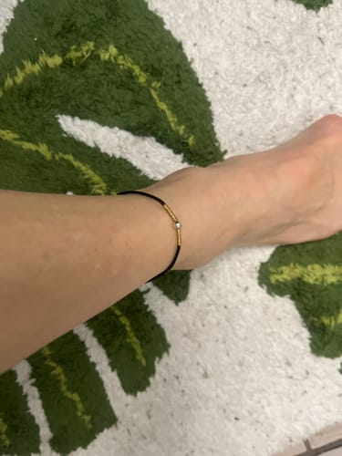 Customer photo review of Buddha Stones 925 Sterling Silver Golden Bead Protection Braided Rope Bracelet Anklet