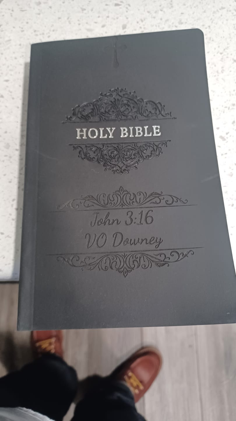 Customer photo review of Personalized NIV Bible Black - Engraved Cross Floral Frame