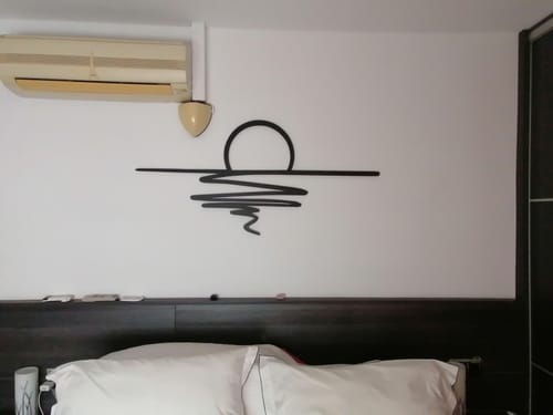 Customer photo review of Décoration murale en métal - Coucher du soleil (SUN.01)