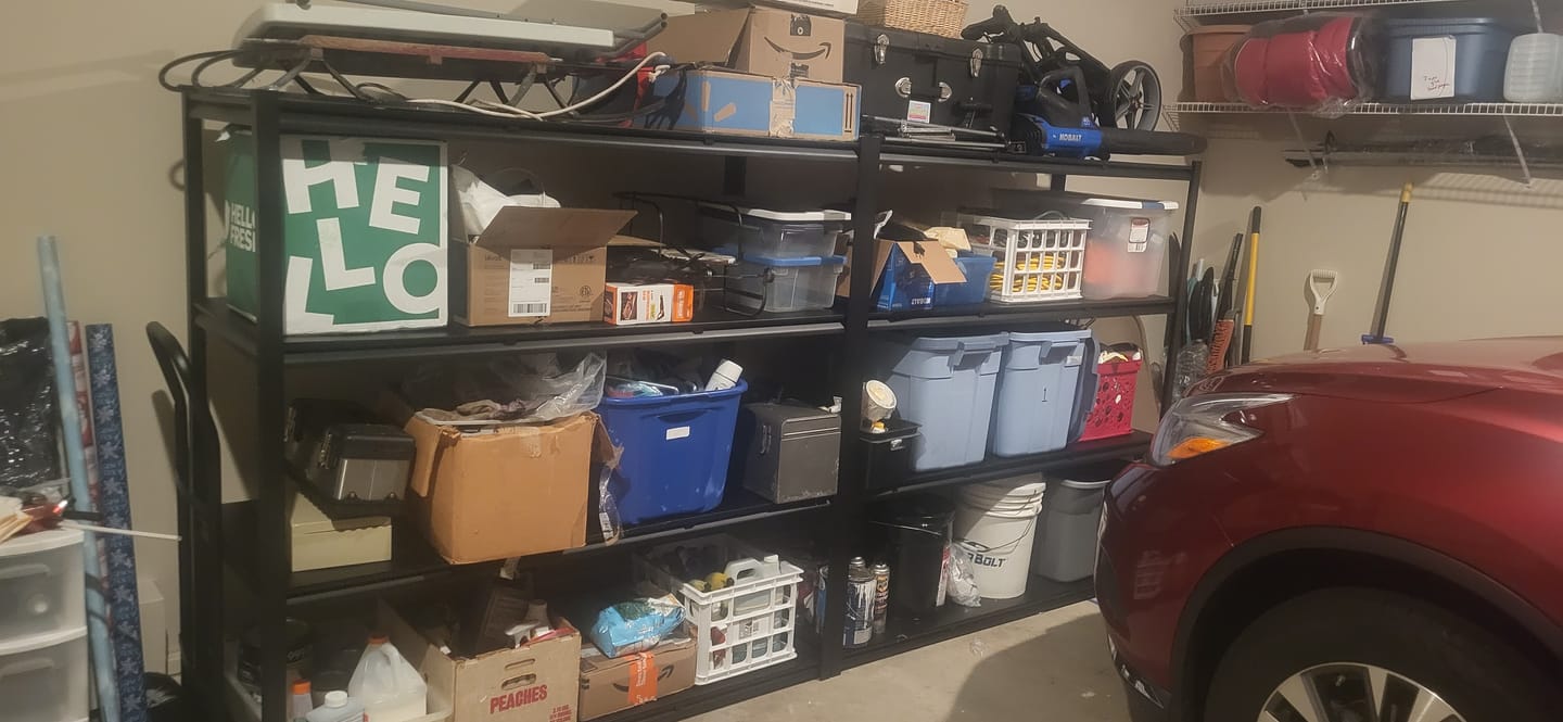 Customer photo review of Reibii 4-Tier 2650LBS Heavy Duty Industrial Garage Shelving Units,60" W Adjustable Metal Storage Shelves Racks for Garage, Warehouse, Basement