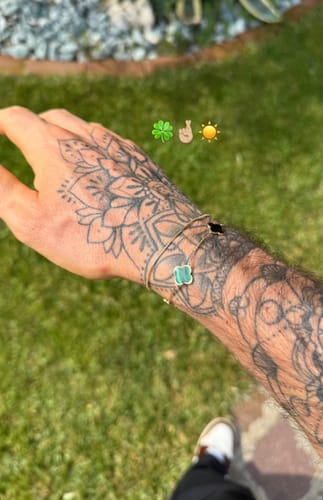 Customer photo review of Bracciale quadrifogli alternato Malachite e Onice in Oro 18kt