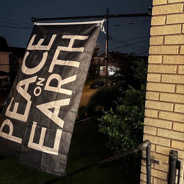 Customer photo review of Peace On Earth Flag