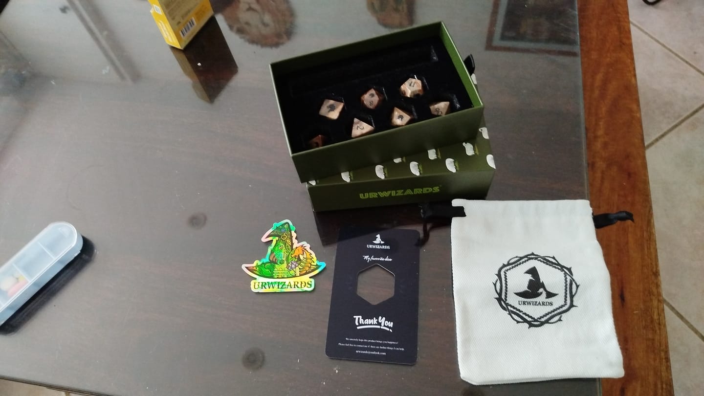Customer photo review of URWizards Custom font style for dice, Custom initial on Dice, Dnd Natural Gemstone Dice MTG Game