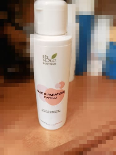 Customer photo review of Olio Riparatore Capelli