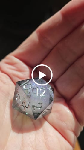 Customer video review of URWizards D&D Starry Liquid Heart Resin Engraved Dice Set
