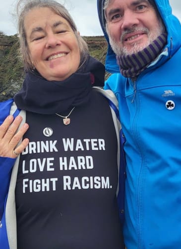 Customer photo review of Drink Water Fight Racism Unisex T-shirt