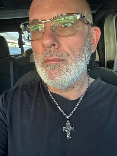 Customer photo review of INRI Cross - Victory Over Sin & Death Necklace: Helps Pair Veterans With A Service Dog Or Shelter Dog.