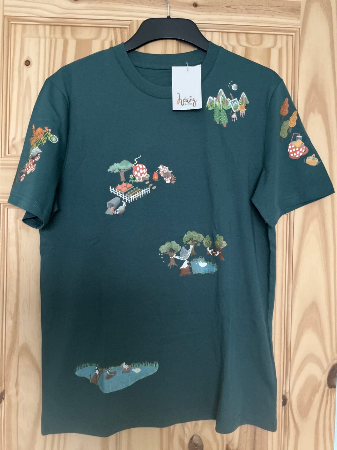 Customer photo review of Woodland village t-shirt