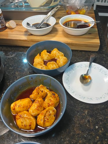 Customer photo review of Frozen [F4] Lamb Dumplings w/ Spicy & Sour Sauces (35 Pieces/7 Servings)