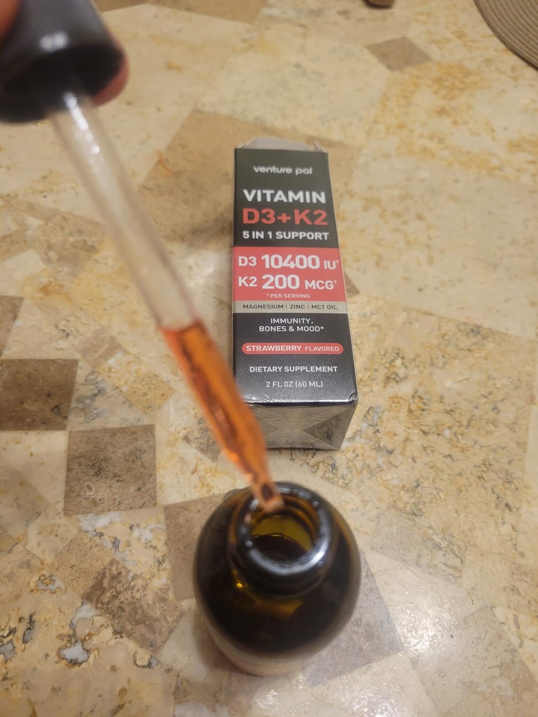 Customer photo review of Vitamin D3 10000 IU Plus K2 (MK-7) - Strawberry Flavor - 200 mcg Liquid Drops