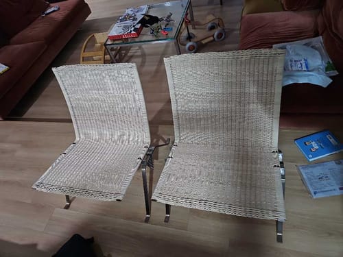 Customer close-up of PK22 wicker and steel frame