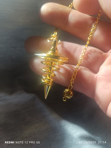 Customer photo review of Péndulo Espiral de Bronce || Limpieza - Desbloqueo Energético