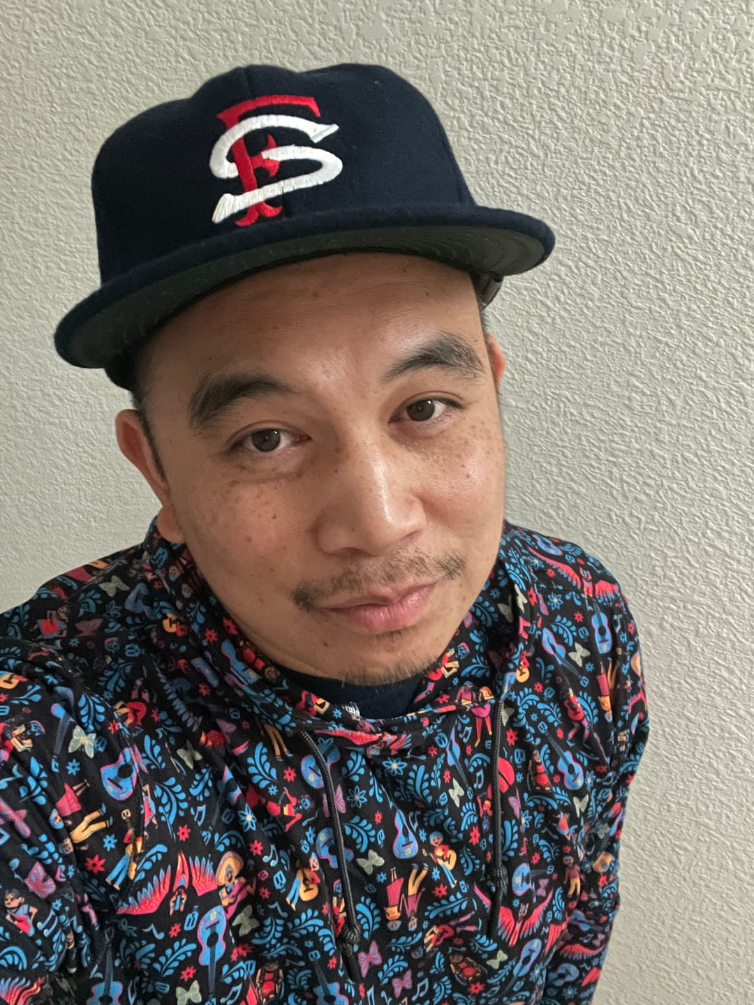 Customer photo review of Disney and Pixar Coco "Music In Me" – Performance Hoodie