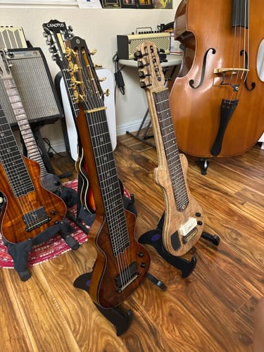 Customer photo review of BunnyNest A-Frame Guitar Stand – Collapsible, Lightweight, Portable, & Universal for Acoustic, Electric, and Bass Guitars